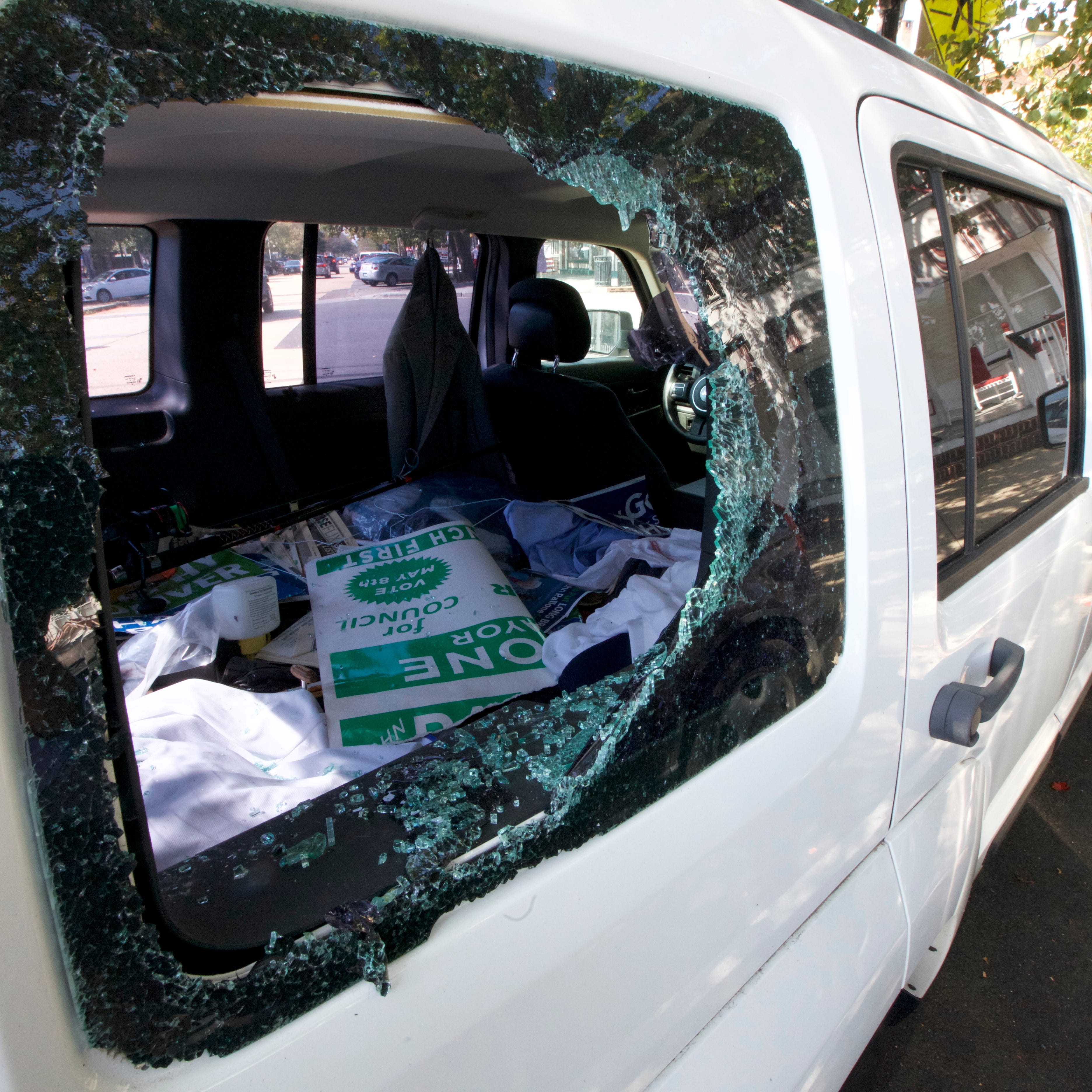 Two Asbury Park police officers were accused of smashing cars owned by Ernest Mignoli after he filed a complaint against them.