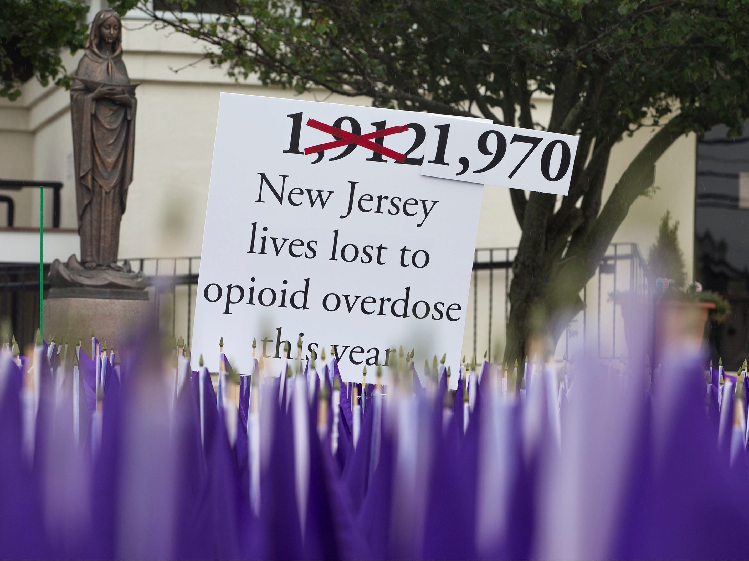 A sea of purple flags along the front lawn of Our Lady Star of the Sea represents the lives lost to opioid overdose in the state of New Jersey. As of today, International Overdose Awareness Day, which occurs every August 31, New Jersey has lost 1,970 lives. Manasquan, NJ Friday, August 31, 2018 