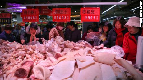 China cuts some tariffs to boost trade and take heat out of pork prices