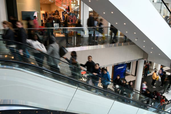 Holiday shoppers at the Pentagon City Mall in Arlington, Va., in late November. The retail sector added 41,000 jobs in December, dwarfing  manufacturing-sector losses.