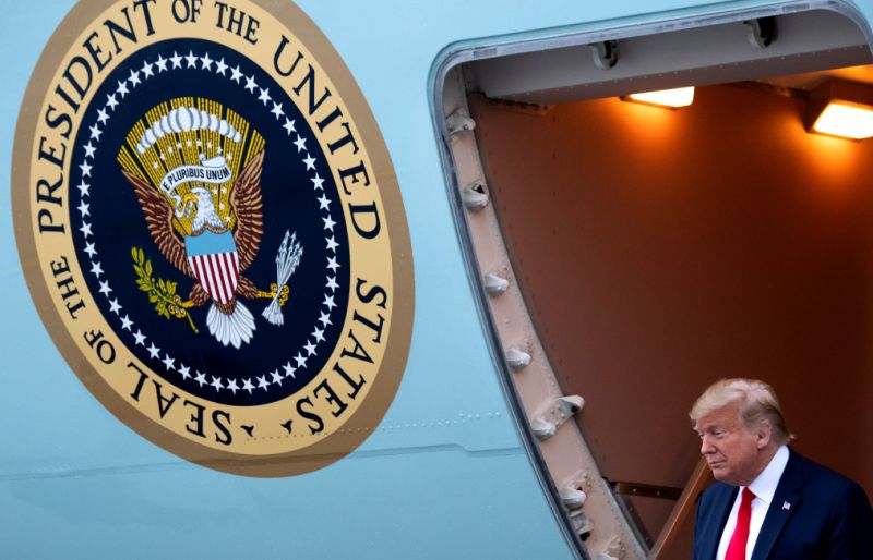 US President Donald Trump disembarks from Air Force One upon arrival at Miami International Airport in Miami, Florida, January 23, 2020, as he travels to speak at the Republican National Committee Winter Meeting. (Photo by SAUL LOEB / AFP) (Photo by SAUL LOEB/AFP via Getty Images)