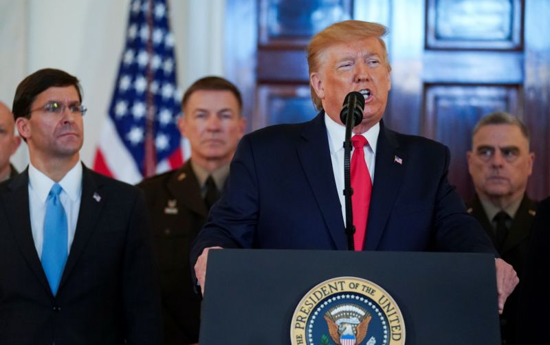 U.S. President Donald Trump delivers a statement about Iran flanked by U.S. Defense Secretary Mark Esper, Army Chief of Staff General James McConville and Chairman of the Joint Chiefs of Staff Army General Mark Milley in the Grand Foyer at the White House in Washington, U.S., January 8, 2020. REUTERS/Kevin Lamarque