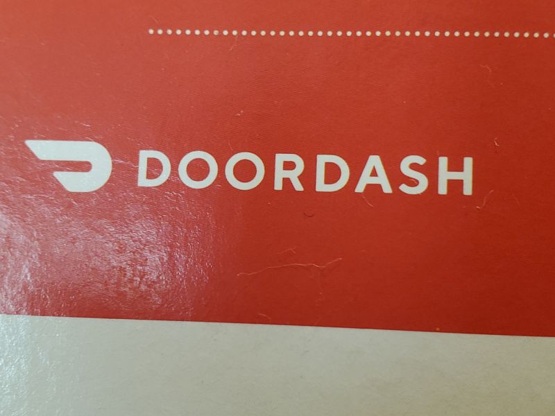 Close-up of logo for food delivery service Doordash, August 30, 2019. (Photo by Smith Collection/Gado/Getty Images)