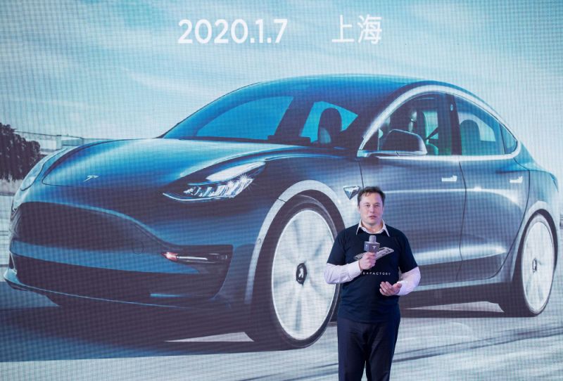 SHANGHAI, Jan. 7, 2020 -- Tesla CEO Elon Musk speaks at a delivery ceremony for Tesla China-made Model 3 in Shanghai, east China, Jan. 7, 2020. U.S. electric carmaker Tesla officially delivered the first batch of 10 made-in-China Model 3 sedans to the public Tuesday afternoon, one year after the company broke ground on its first overseas plant. The company also announced the launch of a project to manufacture Model Y vehicles in its Shanghai gigafactory.(Photo by Ding Ting/Xinhua via Getty) (Xinhua/Ding Ting via Getty Images)