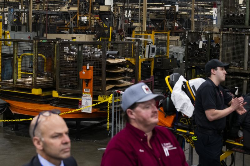 WARREN, MI - JANUARY 30: Employees and guests look on as President Donald Trump speaks at Dana Incorporated, an auto-manufacturing supplier, on January 30, 2020 in Warren, Michigan. During his speech Trump touted good job numbers and the strong performance of car companies in the state. (Photo by Brittany Greeson/Getty Images)