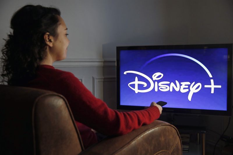 PARIS, FRANCE - DECEMBER 26: In this photo illustration, the Disney + logo is displayed on the screen of a TV on December 26, 2019 in Paris, France. The Walt Disney Company launched its Disney + Streaming Service (Svod) in the United States on November 12, 2019. A month after its launch, Disney Plus has registered 24 million subscribers in the United States, which is very much higher than the forecasts and ambitions of the group, which targeted 20 million subscribers worldwide in 2020. (Photo by Chesnot/Getty Images)