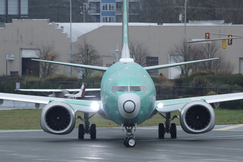 A Boeing 737 Max airplane being built for Norwegian Air International turns as it taxis for take off for a test flight, Wednesday, Dec. 11, 2019, at Renton Municipal Airport in Renton, Wash. The chairman of the House Transportation Committee said Wednesday that an FAA analysis of the 737 Max performed after a fatal crash in 2018 predicted "as many as 15 future fatal crashes within the life of the fleet" during opening remarks at the committee's fifth hearing on the Boeing 737 Max. (AP Photo/Ted S. Warren)