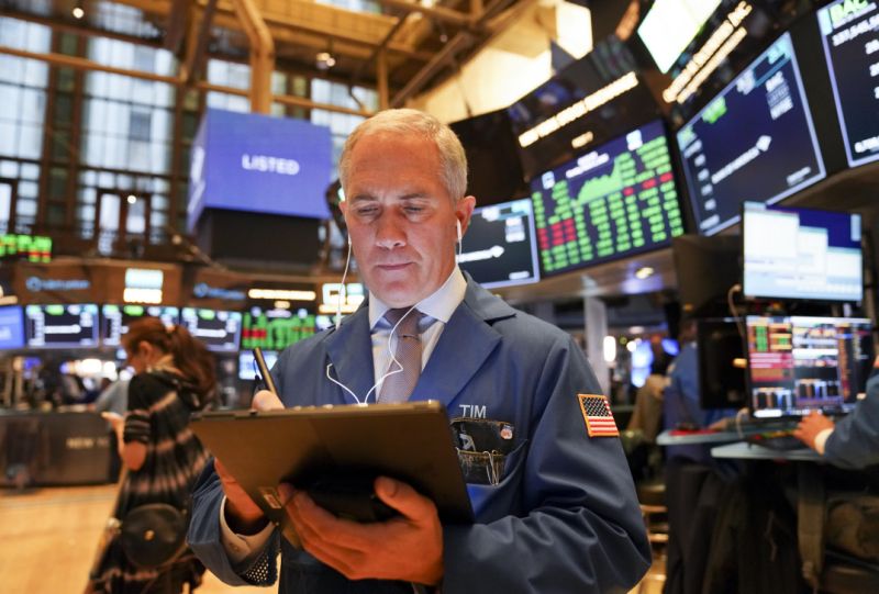 NEW YORK, March 2, 2020 -- A trader works at New York Stock Exchange in New York, the United States, on March 2, 2020. U.S. stocks finished sharply higher on Monday following last week's rout. The Dow Jones Industrial Average soared 1,293.96 points, or 5.09 percent, to 26,703.32. The S&P 500 rallied 136.01 points, or 4.60 percent, to 3,090.23. The Nasdaq Composite Index increased 384.80 points, or 4.49 percent, to 8,952.16. (Photo by Wang Ying/Xinhua via Getty) (Xinhua/Wang Ying via Getty Images)