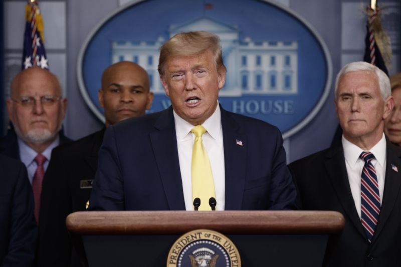 President Donald Trump speaks in the briefing room of the White House in Washington, Monday, March, 9, 2020, about the coronavirus outbreak as Dr. Robert Redfield, director of the Centers for Disease Control and Prevention, U.S. Surgeon General Jerome Adams and Vice President Mike Pence, listen. (AP Photo/Carolyn Kaster)