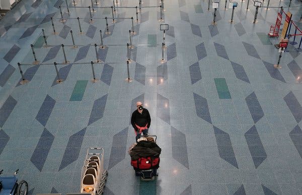 A mostly empty departure hall at Tokyo’s Haneda International Airport on Friday. The outlook for travel and tourism has changed abruptly.