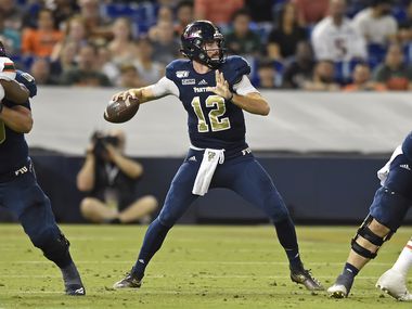 MIAMI, FL - NOVEMBER 23: FIU quarterback James Morgan (12) passes in the third quarter as the FIU Golden Panthers faced the University of Miami Hurricanes on November 23, 2019, at Marlins Park in Miami, Florida. (Photo by Samuel Lewis/Icon Sportswire via Getty Images)