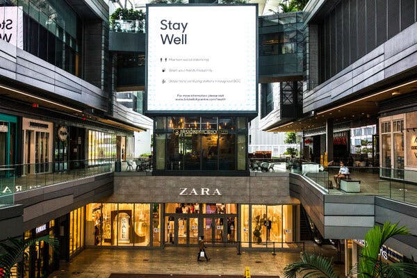 A sign promoting pandemic safety guidelines at Brickell City Center, a mall in Miami.