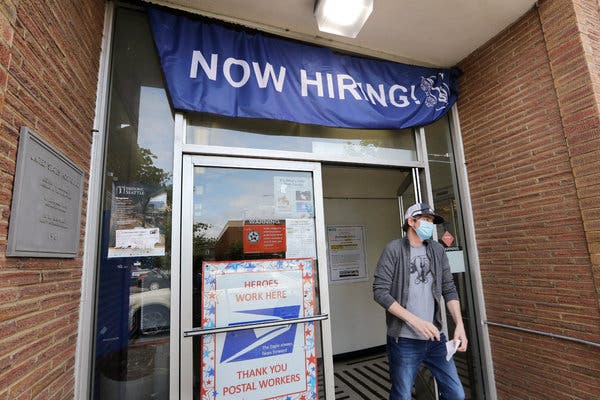 A U.S. Post Office branch in Seattle advertised a job opening this month. Weekly unemployment claims have not dropped below a million since the coronavirus pandemic started.