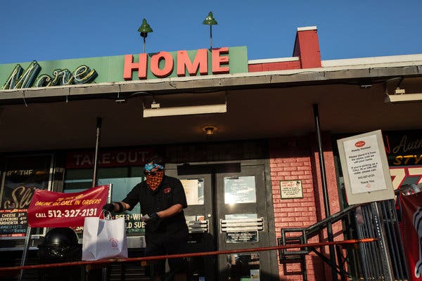 Takeout service at a restaurant in Austin, Tex. Aid to employers and workers has helped the economy weather the pandemic.