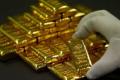 Gold price surge, gold demand, coronavirus, gold bars, gold import, ETF inflows, china gold, gold investment, Goldman Sachs Group Inc