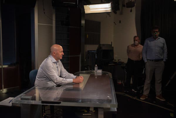 David Solomon, chief executive of Goldman Sachs, setting up for a live call in the firm’s TV studio at its Manhattan headquarters.