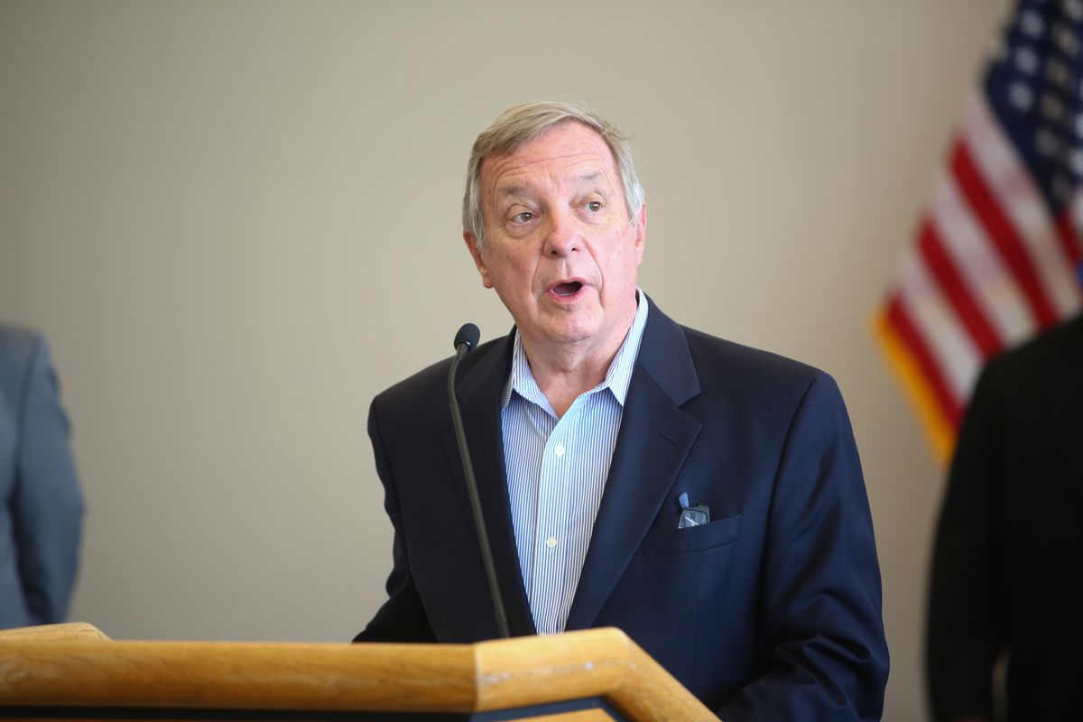 Sen. Dick Durbin, D-Ill., discusses the ongoing effects of cuts to the Postal Service during a news conference in August. 