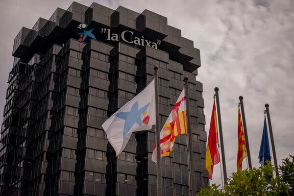 CaixaBank, based in Barcelona, agreed to merge with Bankia, the institution that was at the heart of Spain’s financial crisis and 2012 banking bailout.