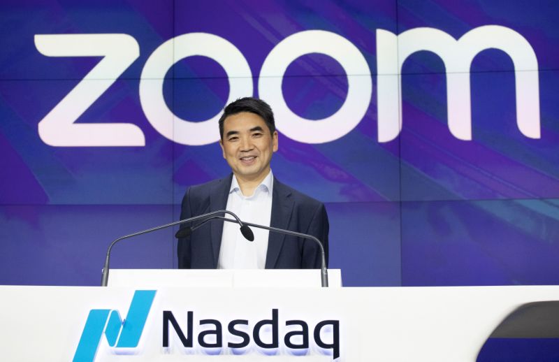 FILE - In this April 18, 2019 file photo, Zoom CEO Eric Yuan attends the opening bell at Nasdaq as his company holds its IPO in New York. Millions of people are now working from home as part of the intensifying fight against the coronavirus outbreak. Beside relying on Zoom, the video conference service, more frequently as part of their jobs, more people are also tapping it to hold virtual happy hours with friends and family banned from gathering in public places. (AP Photo/Mark Lennihan, File)