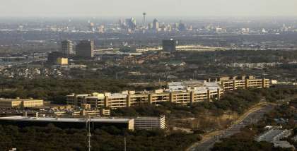 The USAA headquarters building, with downtown San Antonio in the background, is seen in a Feb. 1, 2018 aerial photo.