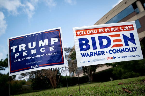 Yard signs supporting President Trump and former Vice President Joe Biden outside of an early voting site in Virginia.