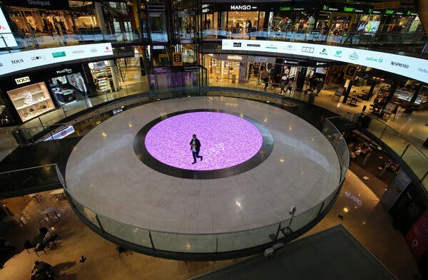 A shopping mall in Barcelona on Wednesday. As the virus has surged again in Europe, the summer’s economic recovery has lost strength.